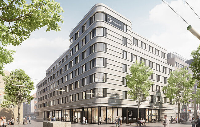 Gebäudeansicht Ecke Tagsüber mit Menschen