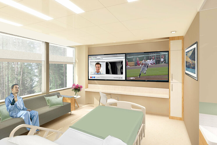 Zimmer eines Patienten mit Bett und Fernseher